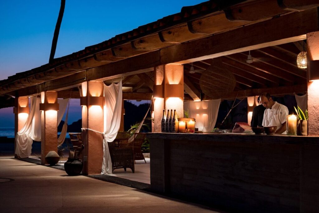 Shio Sushi bar lit up at night, Careyes
