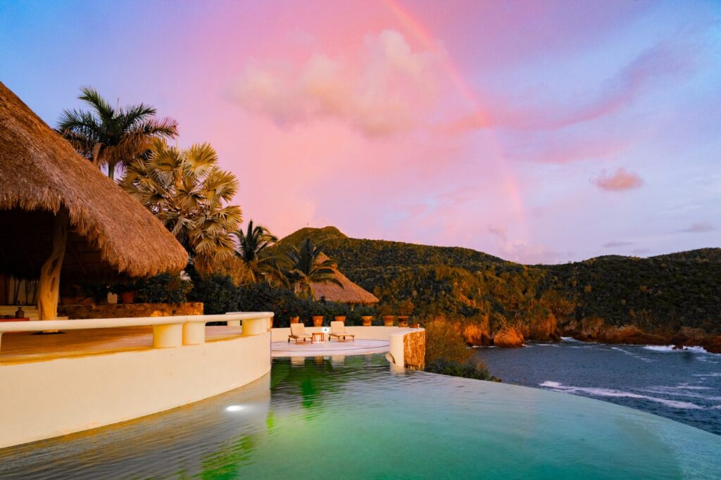 Sunset over the beach and islands of Chamela Bay on the Costalegre