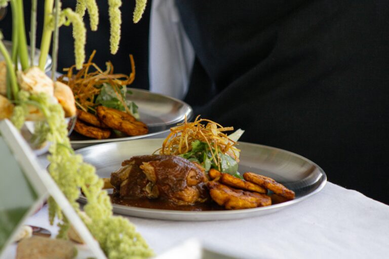 Chef-plated vegetable dish served at the table
