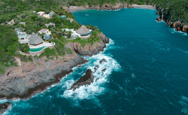 Aerial view of a turquoise cove on the Costalegre coast near Casa Papelillo