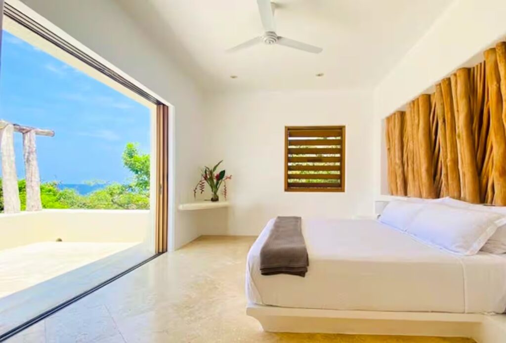 The Sun master suite opening onto the garden at Casa Papelillo