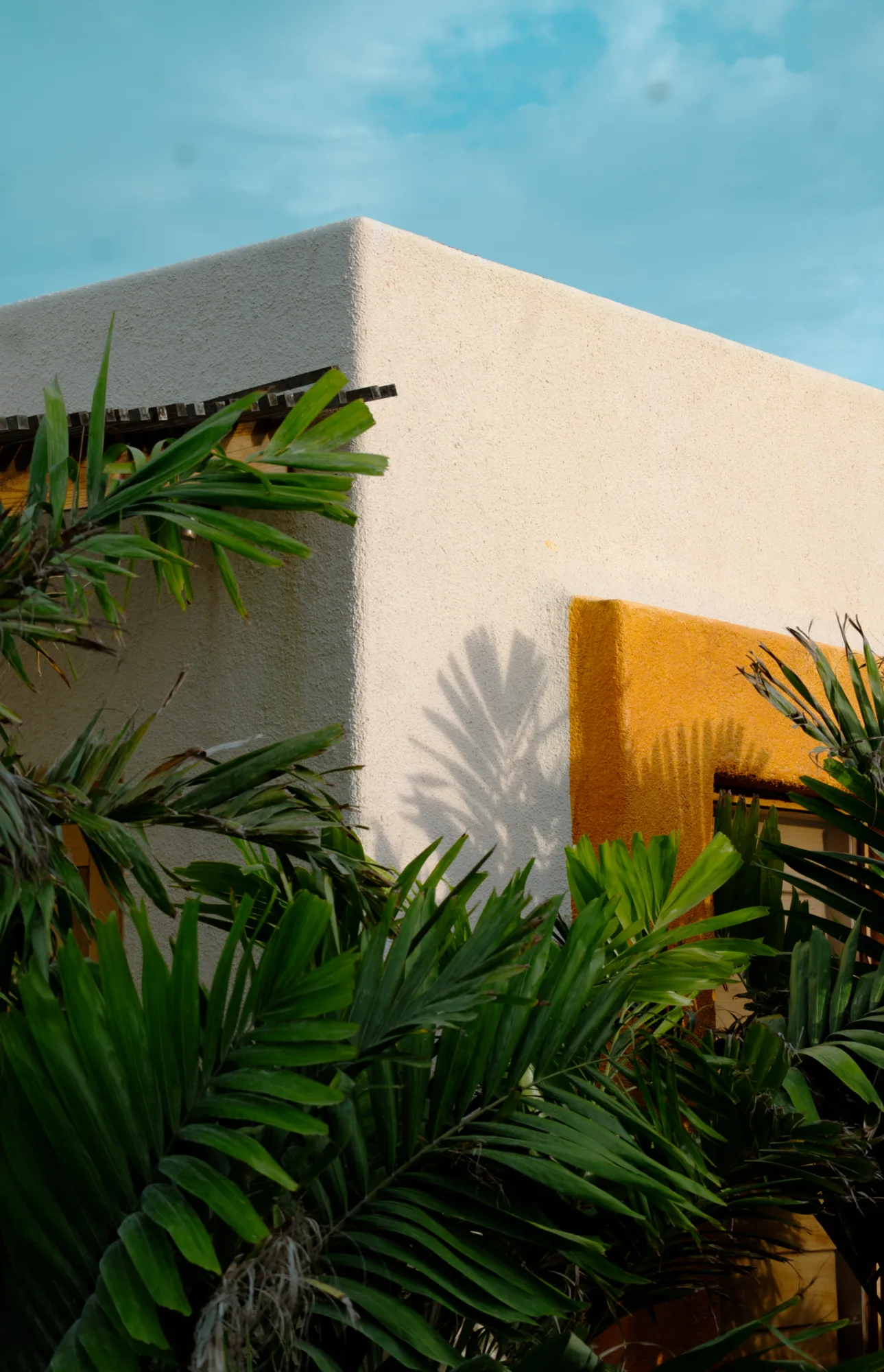 Terracotta terrace wall at a private oceanfront villa near Careyes — Casa Papelillo